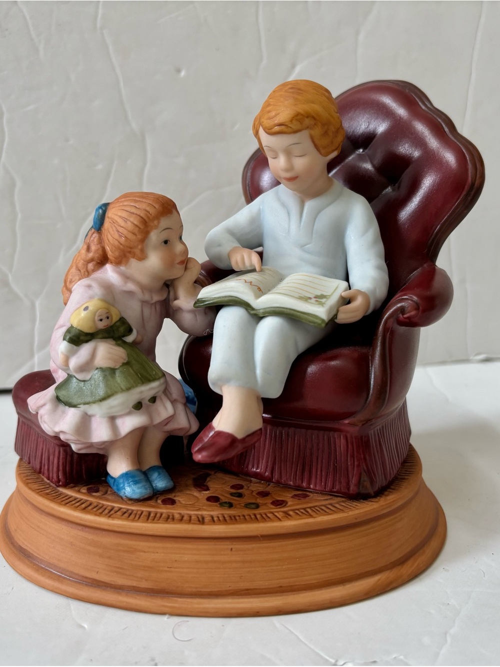 Avon Porcelain Children Figurine with Burgundy Chair and Pastel Attire